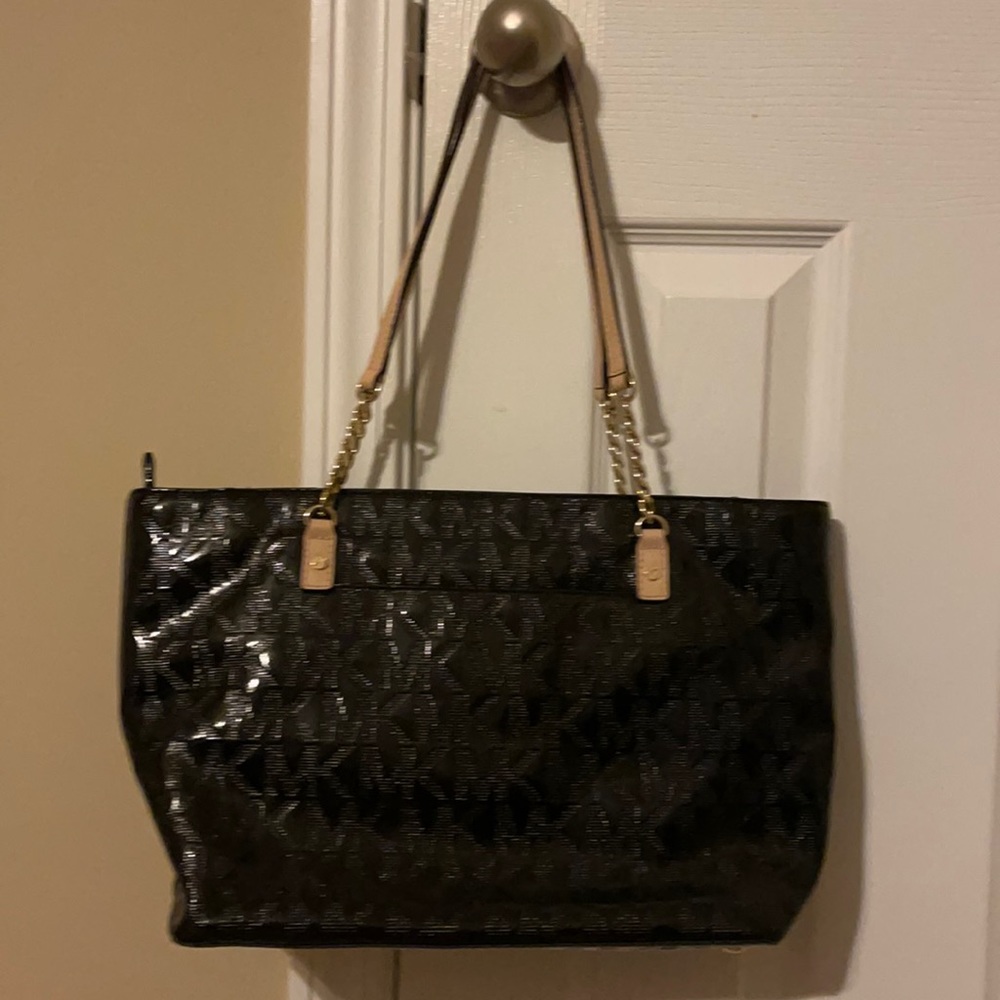 Michael Kors black Patton leather Medium size NWOT.